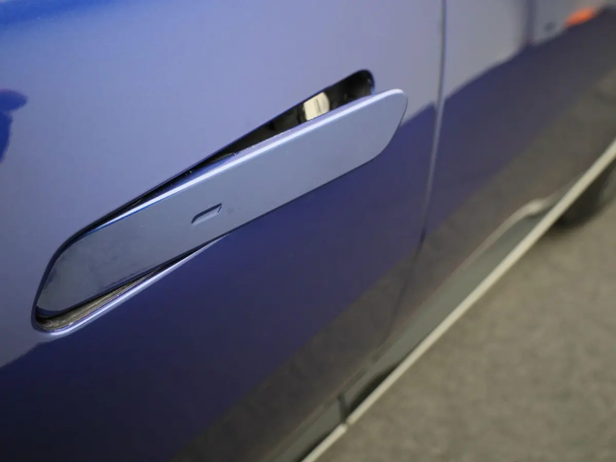 Plus 77.4 kWh | 100% SOH | Voorstoelen Verwarmd/Gekoeld | Trekhaak | Achterbank Verwarmd | Warmtepomp | Adaptieve Cruise Control | Sfeerverlichting | Apple Carplay/Android Auto | Kunstledere
