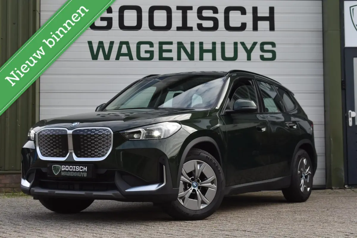 eDrive20 67 kWh | Carplay | Stoelverwarming | 100% SOH | Privacy Glass |