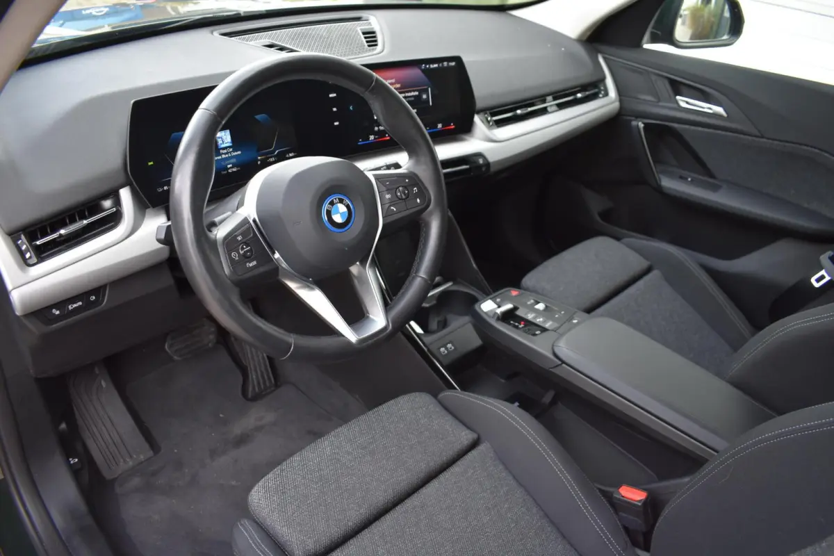 eDrive20 67 kWh | Carplay | Stoelverwarming | 100% SOH | Privacy Glass |