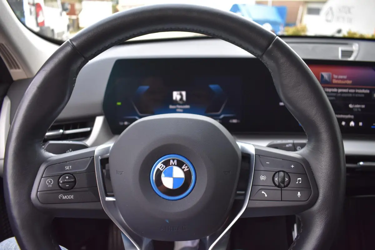 eDrive20 67 kWh | Carplay | Stoelverwarming | 100% SOH | Privacy Glass |