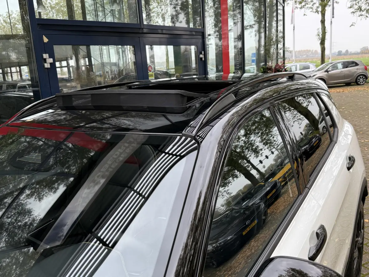 1.5 More | Panoramadak | Leer | Climate Control | Apple Carplay | Navigatie | Licht metalen velgen
