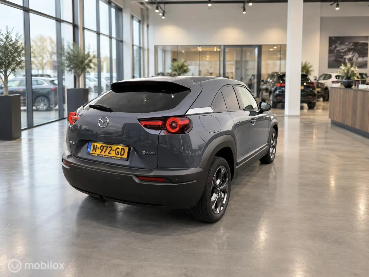 e-SkyActiv 145 36 kWh | SOH 93% | 51.794 KM | HUD | Memory Seats | Stoel- en Stuurverwarming
