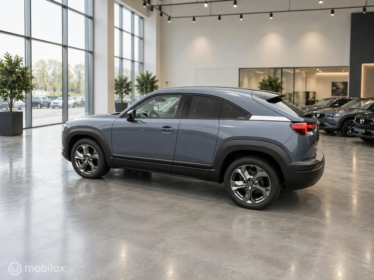 e-SkyActiv 145 36 kWh | SOH 93% | 51.794 KM | HUD | Memory Seats | Stoel- en Stuurverwarming