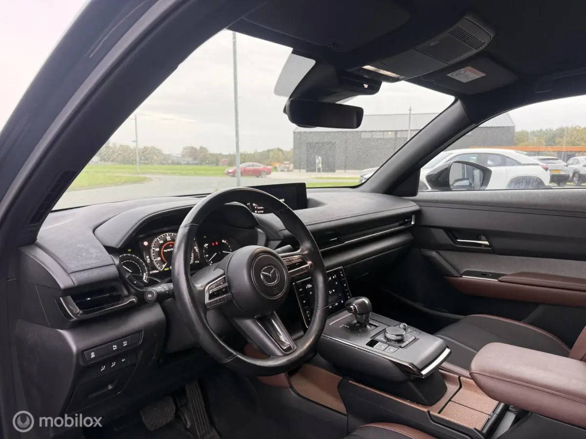 e-SkyActiv 145 36 kWh | SOH 93% | 51.794 KM | HUD | Memory Seats | Stoel- en Stuurverwarming
