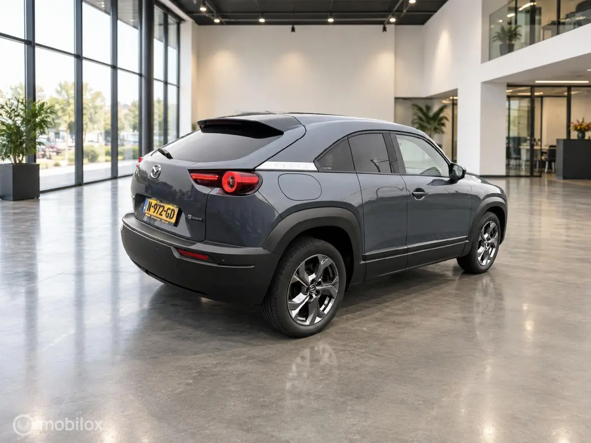 e-SkyActiv 145 36 kWh | SOH 93% | 51.794 KM | HUD | Memory Seats | Stoel- en Stuurverwarming