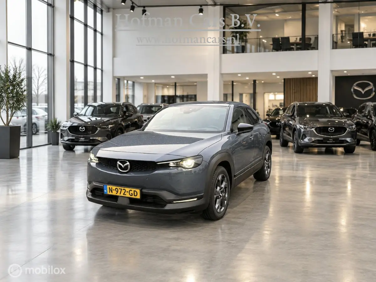 e-SkyActiv 145 36 kWh | SOH 93% | 51.794 KM | HUD | Memory Seats | Stoel- en Stuurverwarming