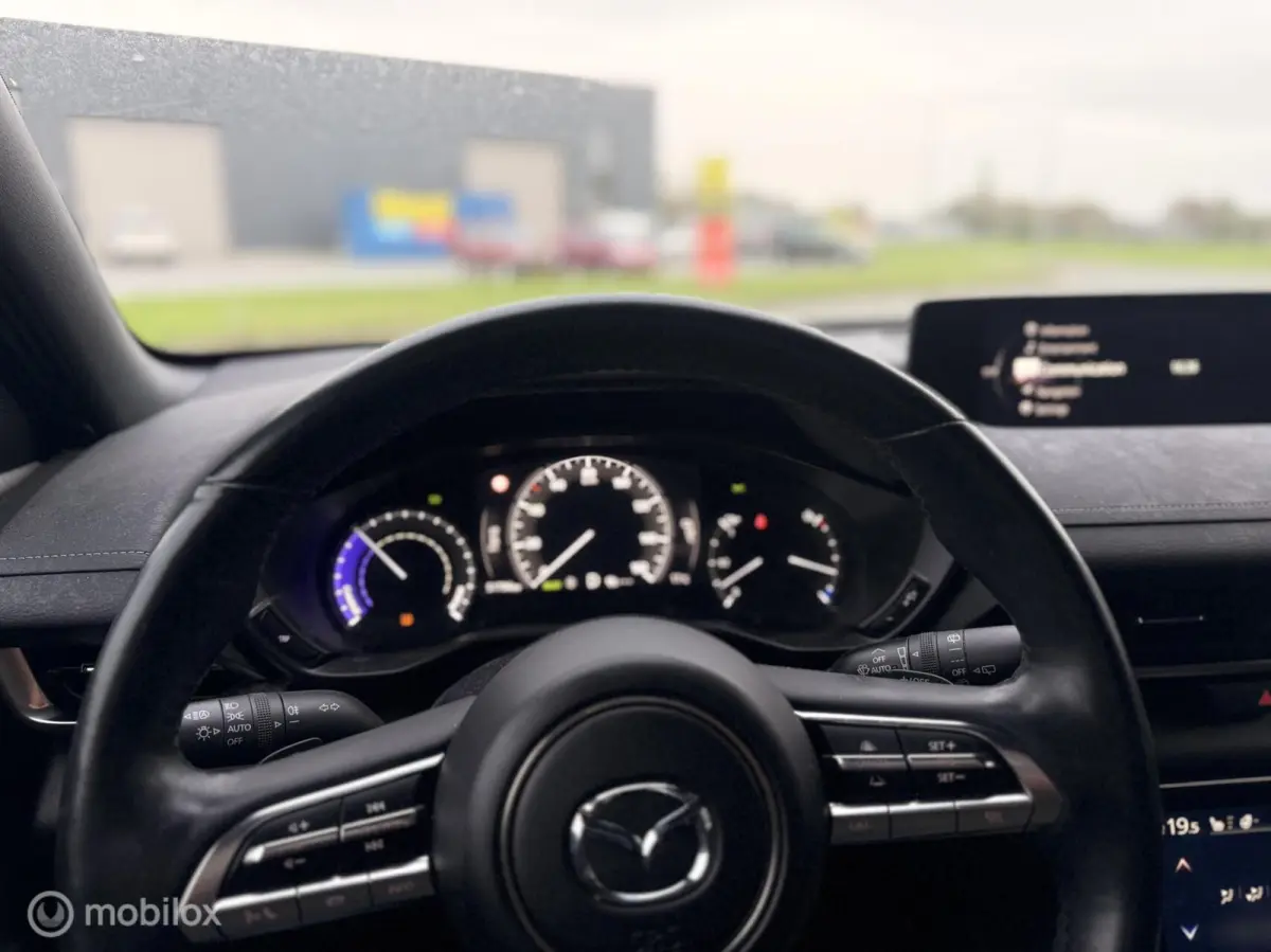 e-SkyActiv 145 36 kWh | SOH 93% | 51.794 KM | HUD | Memory Seats | Stoel- en Stuurverwarming