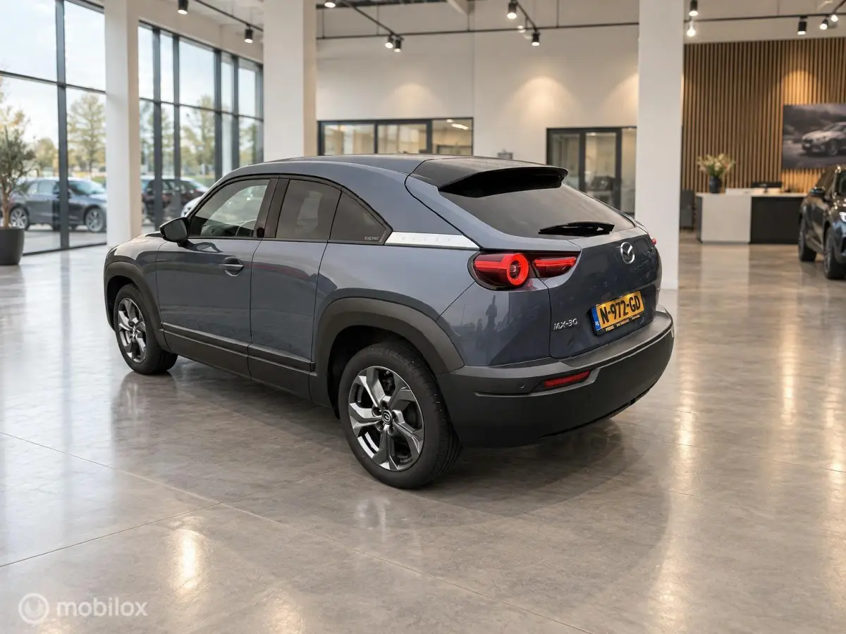 e-SkyActiv 145 36 kWh | SOH 93% | 51.794 KM | HUD | Memory Seats | Stoel- en Stuurverwarming