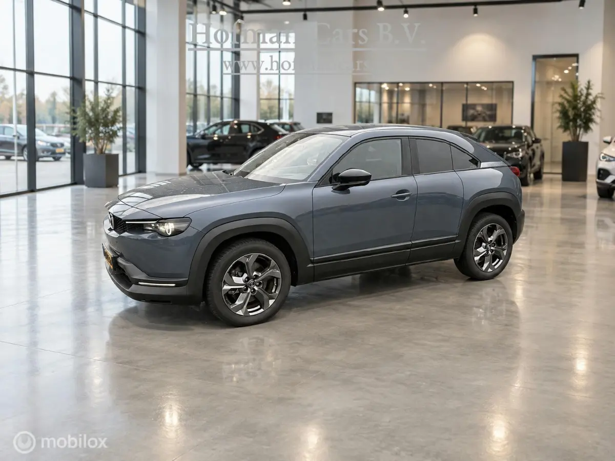 e-SkyActiv 145 36 kWh | SOH 93% | 51.794 KM | HUD | Memory Seats | Stoel- en Stuurverwarming