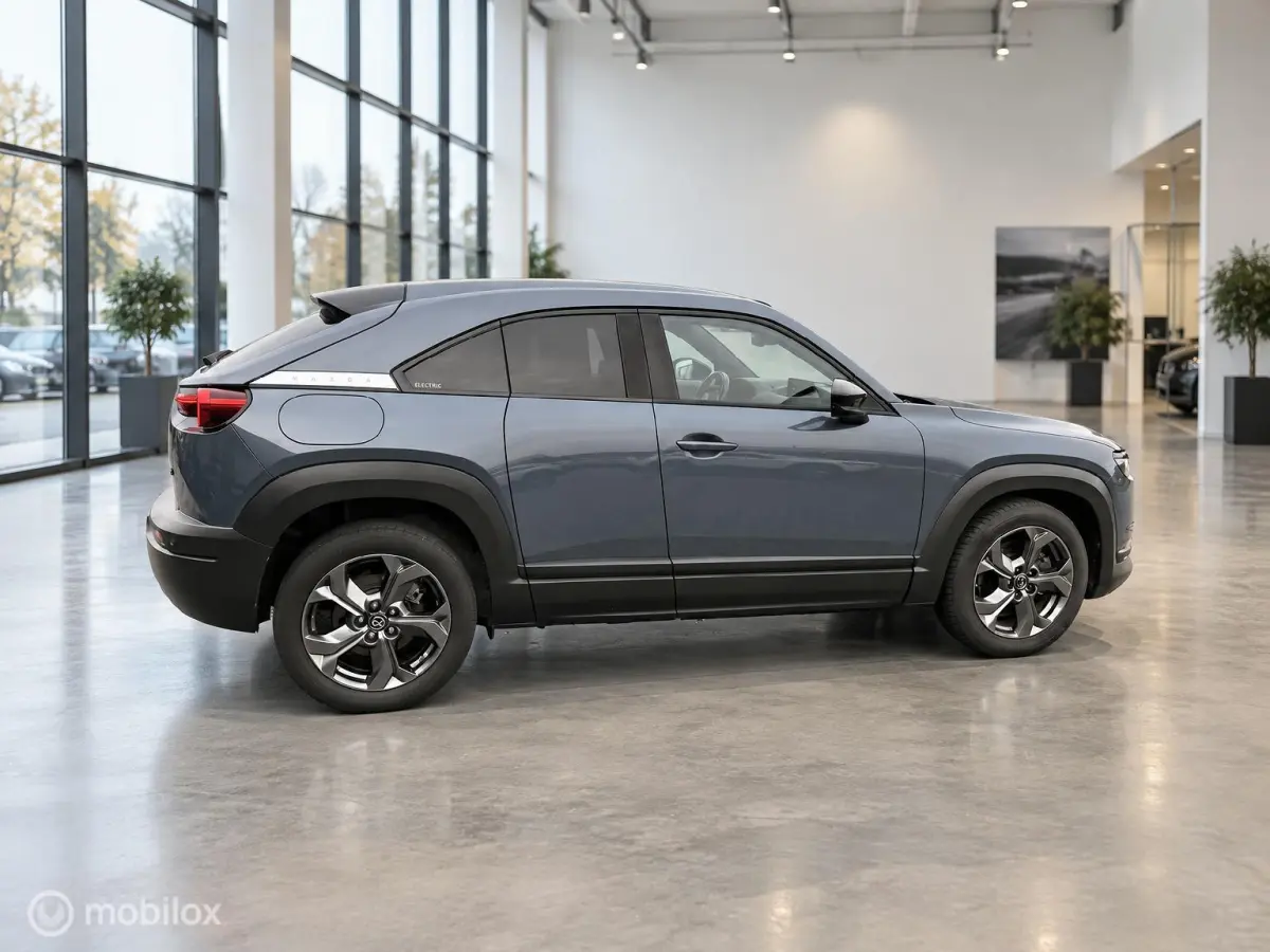 e-SkyActiv 145 36 kWh | SOH 93% | 51.794 KM | HUD | Memory Seats | Stoel- en Stuurverwarming