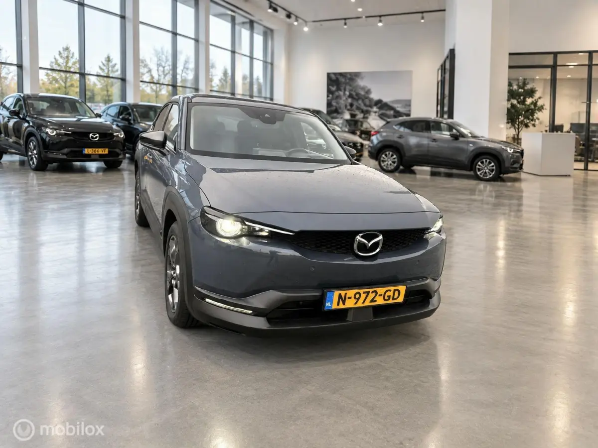 e-SkyActiv 145 36 kWh | SOH 93% | 51.794 KM | HUD | Memory Seats | Stoel- en Stuurverwarming
