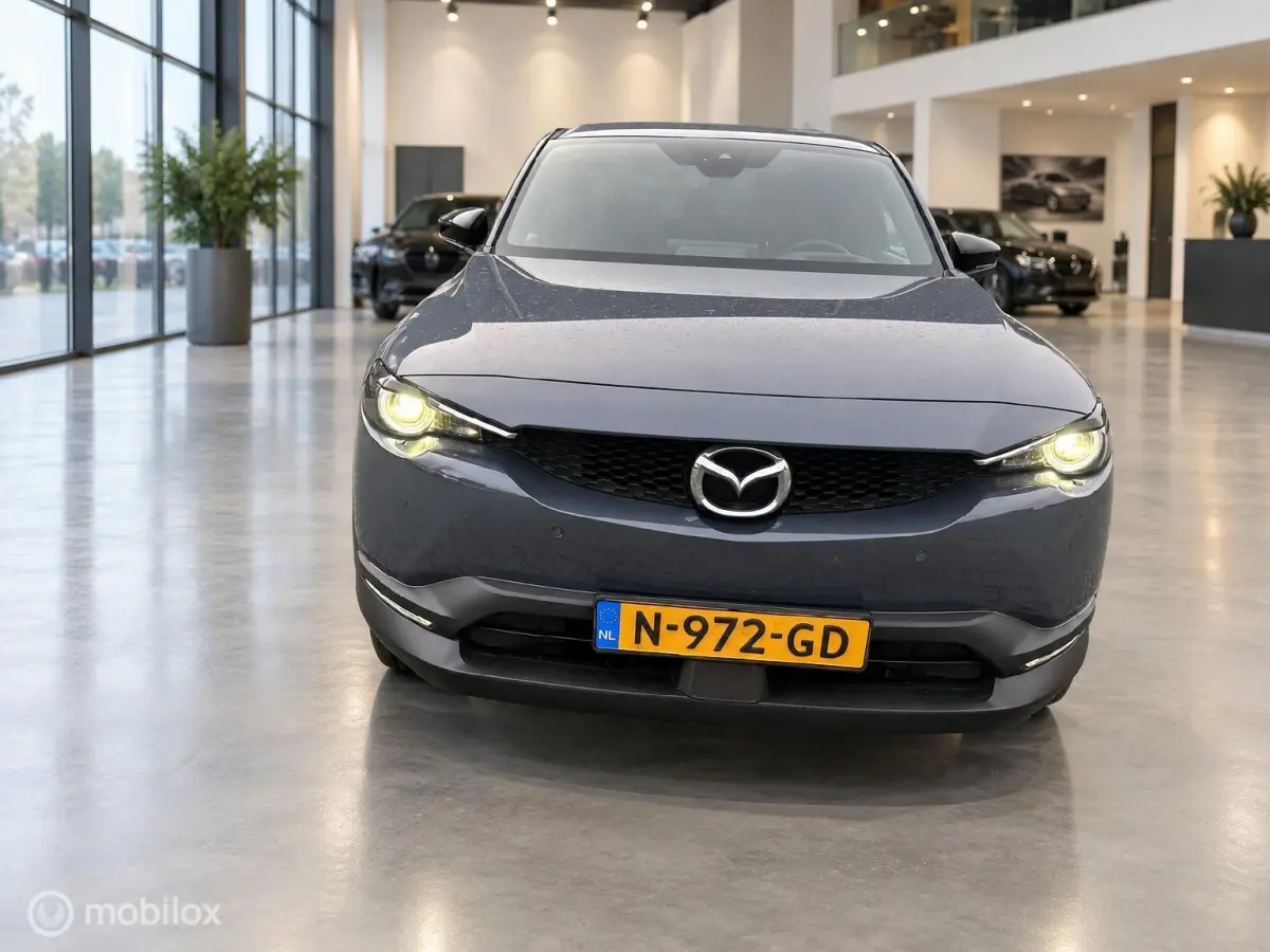 e-SkyActiv 145 36 kWh | SOH 93% | 51.794 KM | HUD | Memory Seats | Stoel- en Stuurverwarming