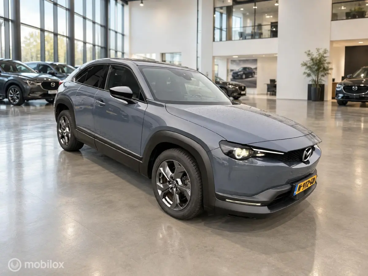 e-SkyActiv 145 36 kWh | SOH 93% | 51.794 KM | HUD | Memory Seats | Stoel- en Stuurverwarming