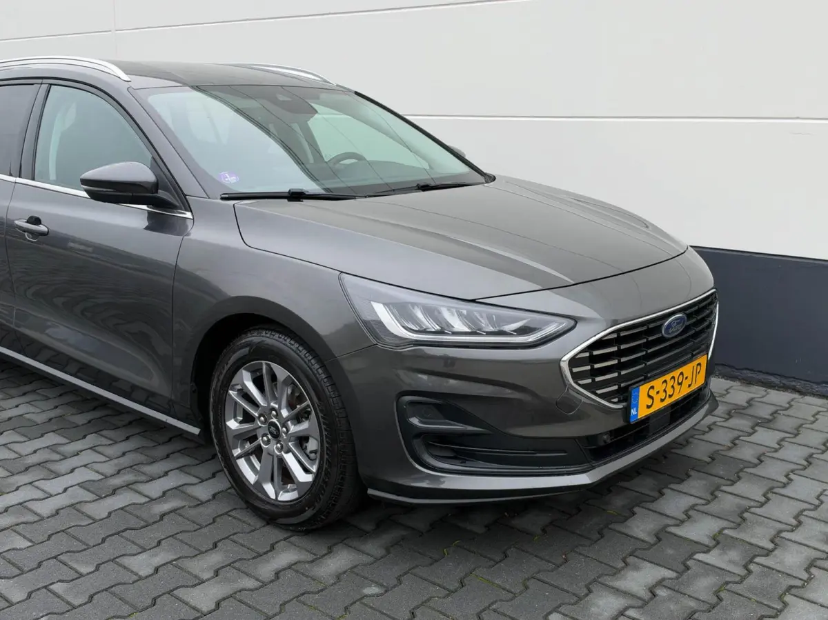 1.0 EcoBoost Hybrid 125pk Titanium | Navigatie | Adaptive cruise | Trekhaak