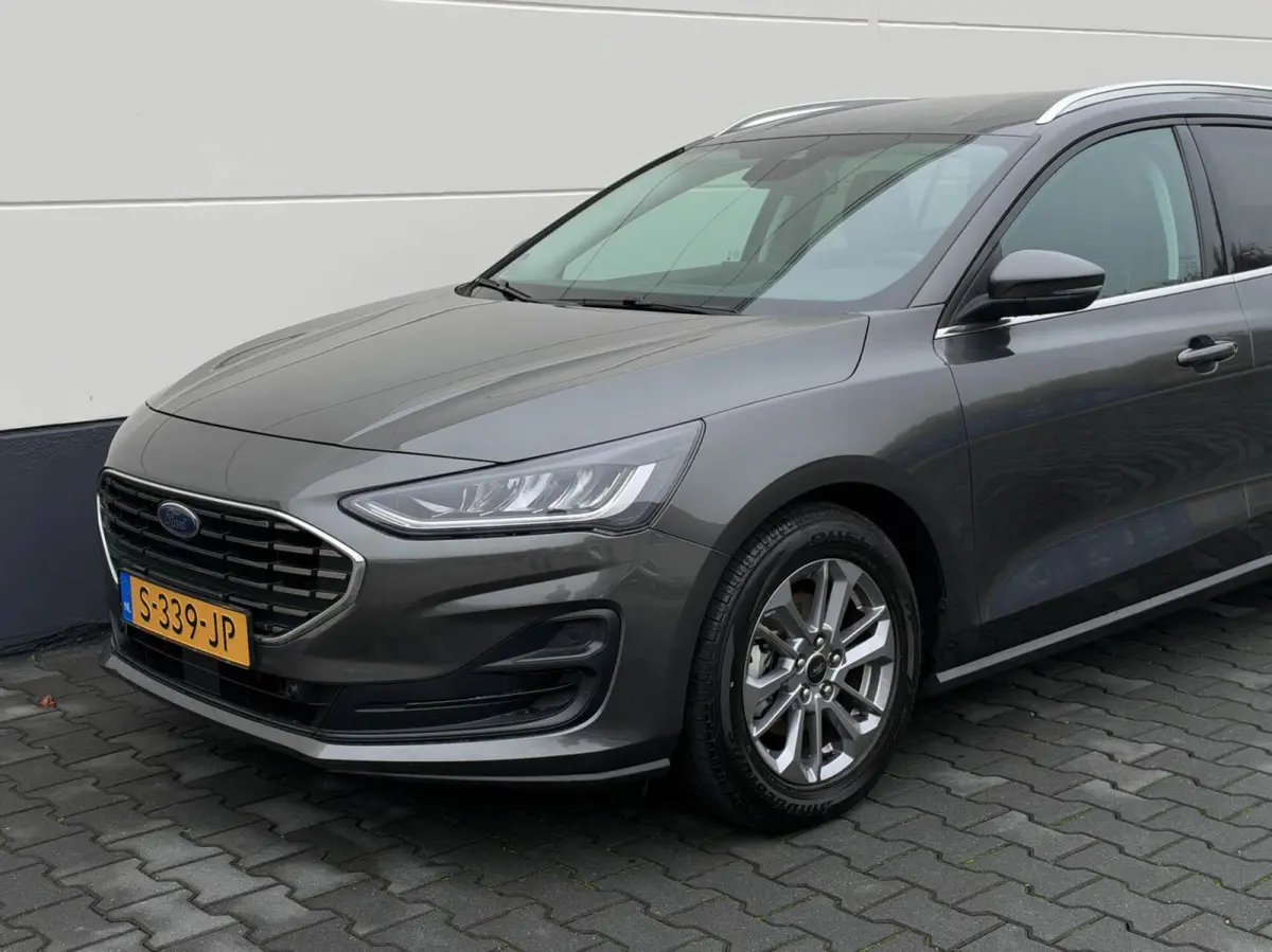1.0 EcoBoost Hybrid 125pk Titanium | Navigatie | Adaptive cruise | Trekhaak