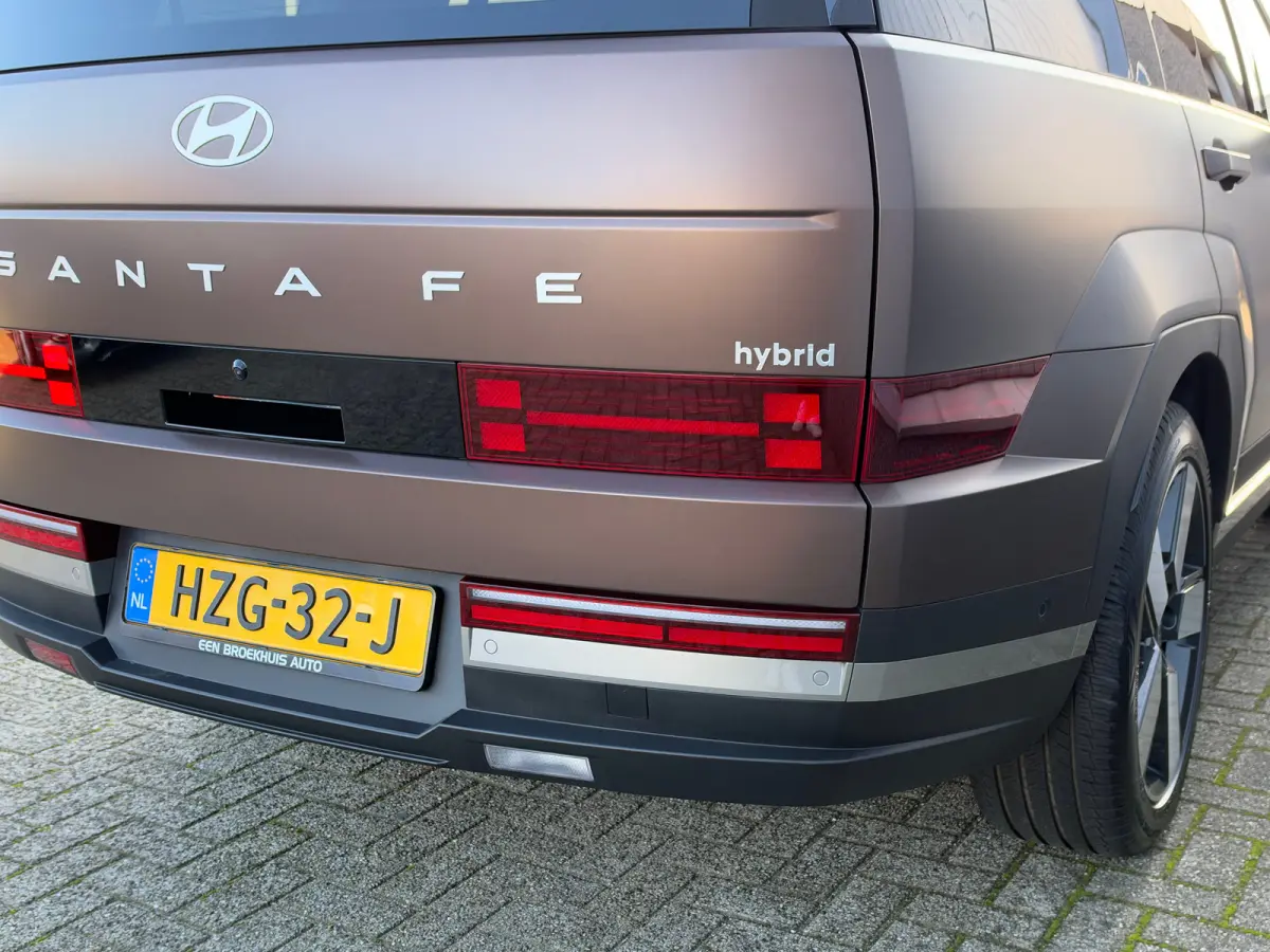1.6 T-GDI HEV Premium 7p | Achterbank verwarmd | Achteruitrijcamera | Buitenspiegels elektrisch verstelbaar