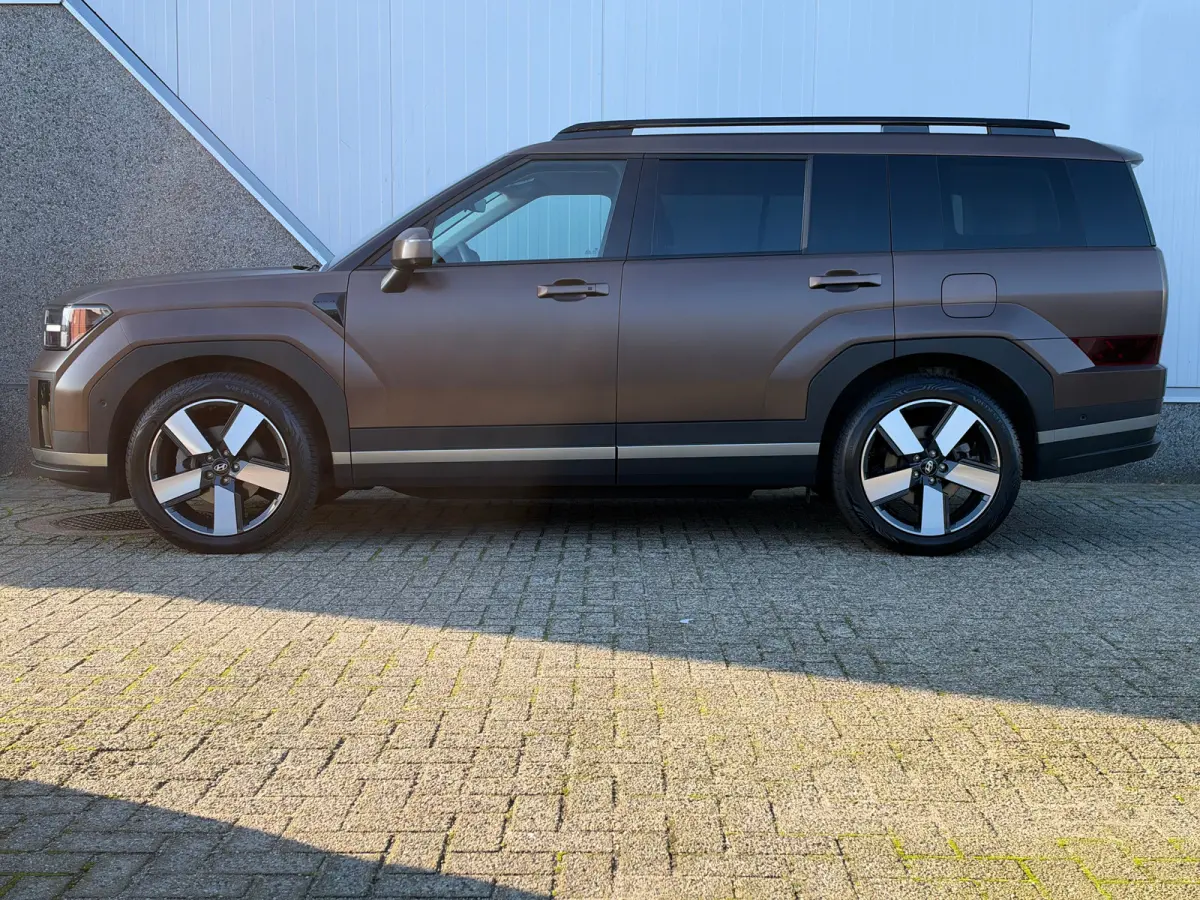 1.6 T-GDI HEV Premium 7p | Achterbank verwarmd | Achteruitrijcamera | Buitenspiegels elektrisch verstelbaar
