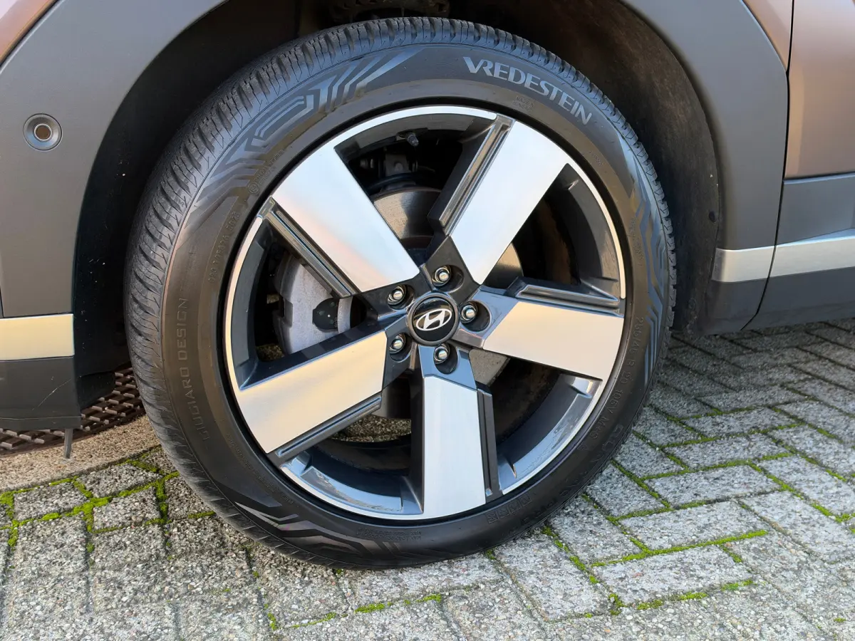 1.6 T-GDI HEV Premium 7p | Achterbank verwarmd | Achteruitrijcamera | Buitenspiegels elektrisch verstelbaar