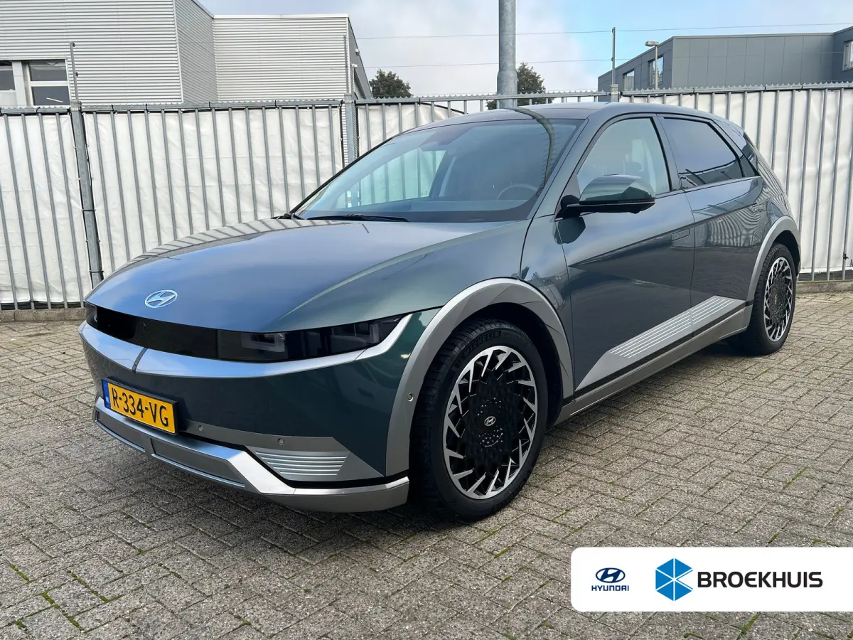 AWD 77 kWh Lounge | Panoramadak | Elektrische trekhaak | Leder | Stoelgeheugen | 360 graden camera | Adaptive cruise controle |  Dodehoek detectie | Elektrische achterklep | Head-up display 