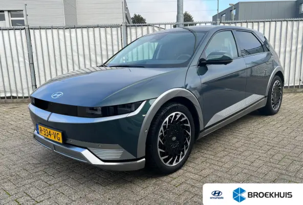 AWD 77 kWh Lounge | Panoramadak | Elektrische trekhaak | Leder | Stoelgeheugen | 360 graden camera | Adaptive cruise controle |  Dodehoek detectie | Elektrische achterklep | Head-up display 