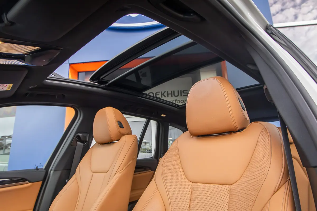 Executive 80 kWh | SOH 98% | Pano | Trekhaak | Leder+memory | Camera | Cruise adaptief | Elektrisch bedienbare achterklep | Stoelverwarming | Achteruitrijcamera | Apple Carplay/Android Auto|