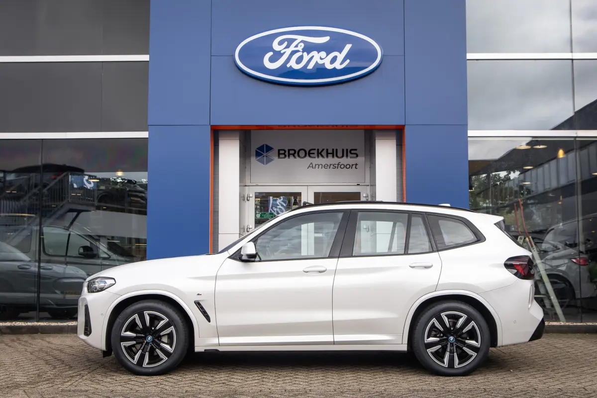 Executive 80 kWh | SOH 98% | Pano | Trekhaak | Leder+memory | Camera | Cruise adaptief | Elektrisch bedienbare achterklep | Stoelverwarming | Achteruitrijcamera | Apple Carplay/Android Auto|