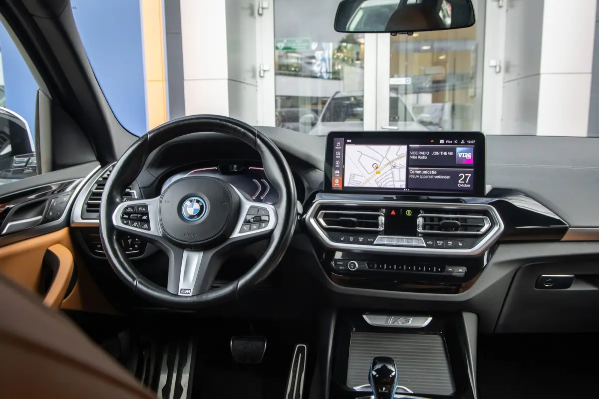 Executive 80 kWh | SOH 98% | Pano | Trekhaak | Leder+memory | Camera | Cruise adaptief | Elektrisch bedienbare achterklep | Stoelverwarming | Achteruitrijcamera | Apple Carplay/Android Auto|
