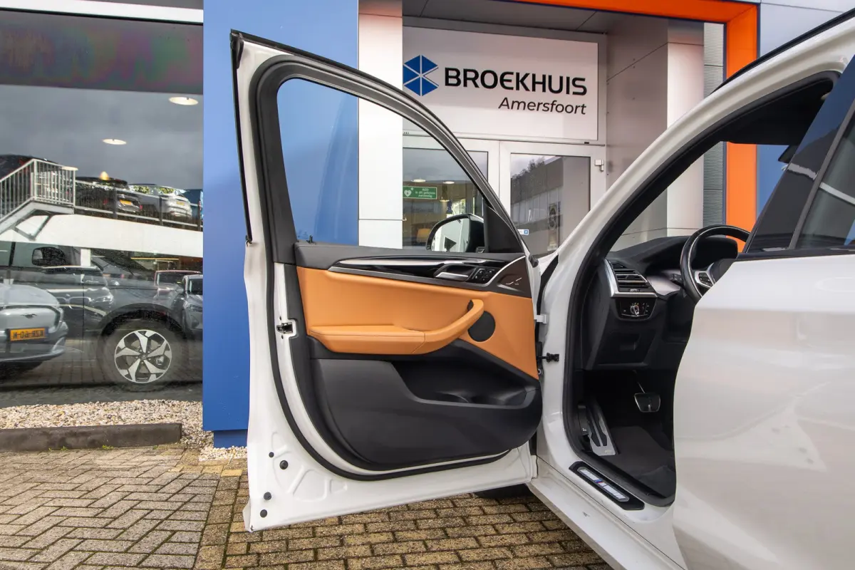 Executive 80 kWh | SOH 98% | Pano | Trekhaak | Leder+memory | Camera | Cruise adaptief | Elektrisch bedienbare achterklep | Stoelverwarming | Achteruitrijcamera | Apple Carplay/Android Auto|