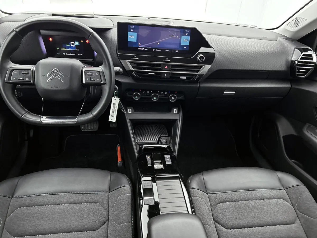 136pk Feel Pack 50 kWh Automaat | 1ste Eigenaar | Navigatie | Climate Control | Cruise Control | 18"LMV | Camera | Full-LED |