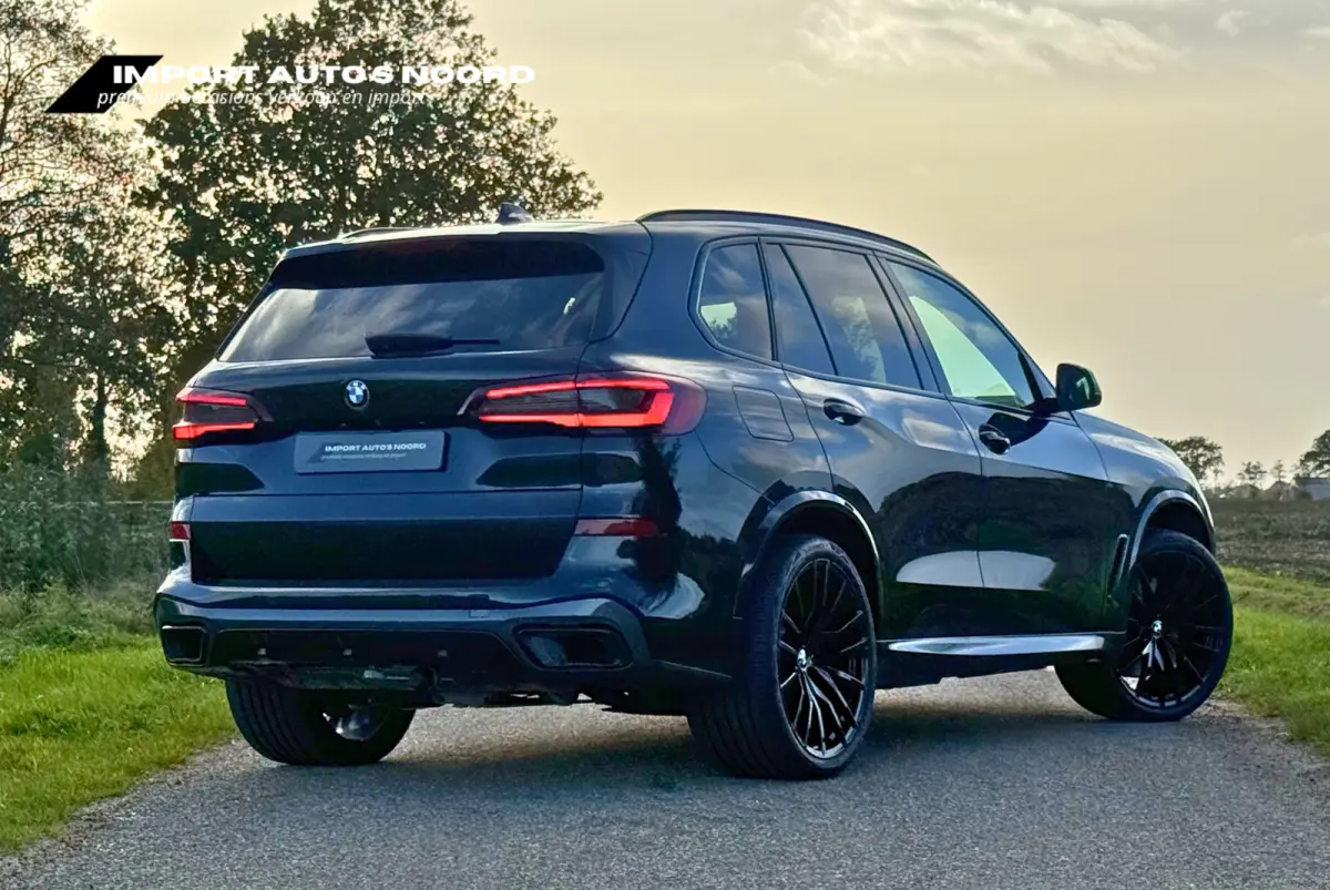 XDrive45e High Executive Pano Trekhaak Luchtvering Sfeerverlichting ACC Memory