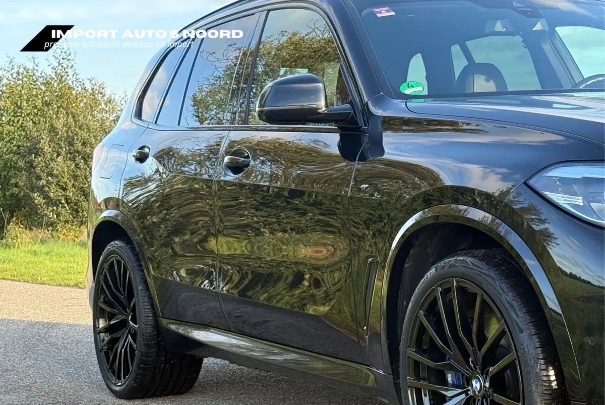 XDrive45e High Executive Pano Trekhaak Luchtvering Sfeerverlichting ACC Memory